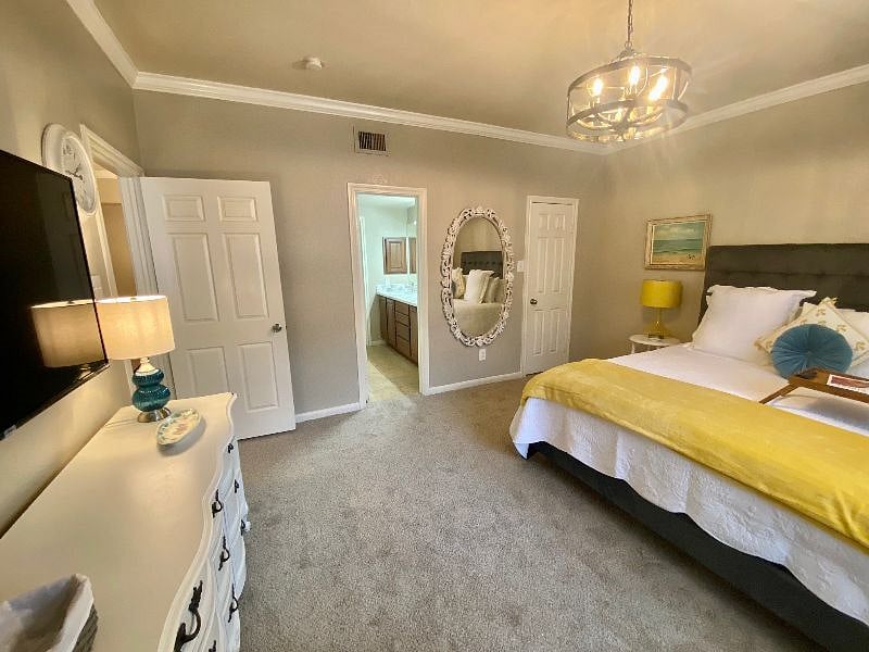 Bedroom has plush brand new carpeting, walk in closet and opens to bathroom and living room.