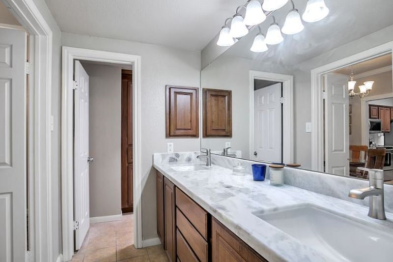 Lots of cabinets for all of your toiletries. The toilet and bath/shower in separate room for maximum privacy.
