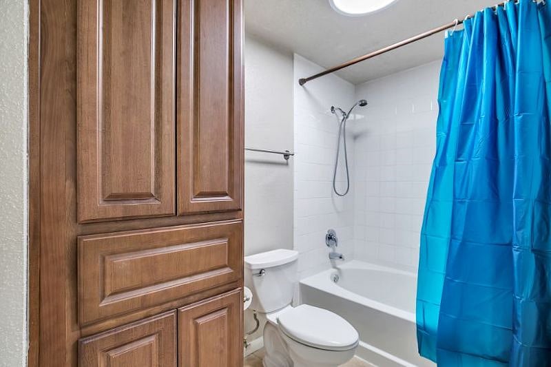 Bathroom has upgraded shower head can be used overhead or hand held. 