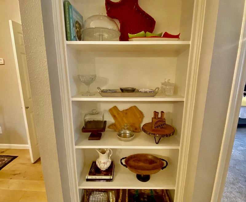 Cake plate, cheese boards, cheese knives, platters for dips and chips, baskets filled with candlesticks and more. 