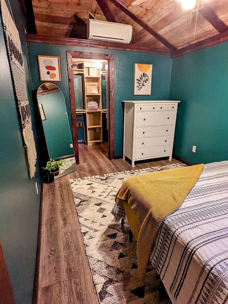 Bedroom w/queen bed, and dresser in addition to huge walk-in closet!