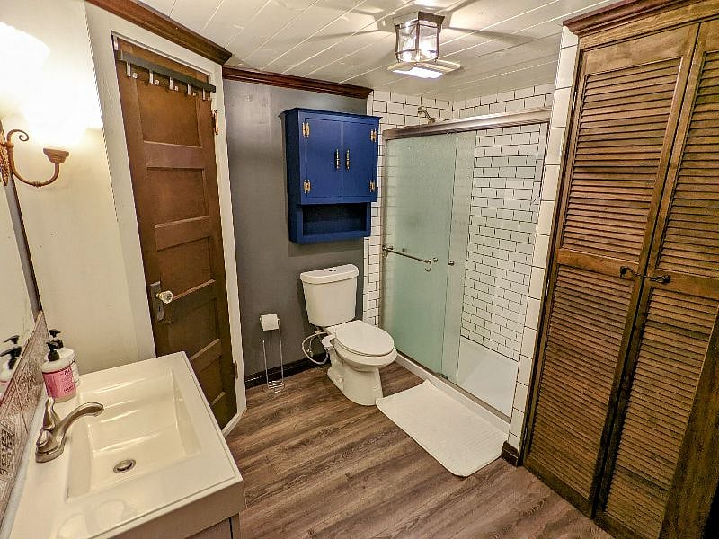 Full bathroom w/attached washer & dryer. Fun tiled accents throughout and a bidet to keep things interesting!