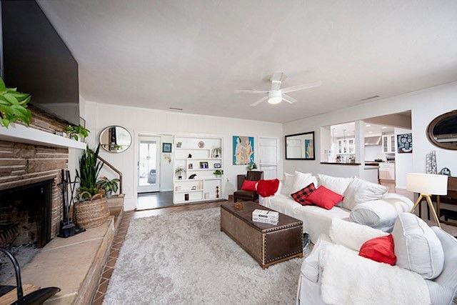 Cozy Family/Tv room with second Wood burning Fireplace.