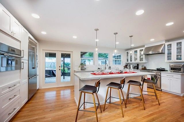 The Kitchen is our pride and Joy. Professional 6 burner range. Great lighting and lots of windows