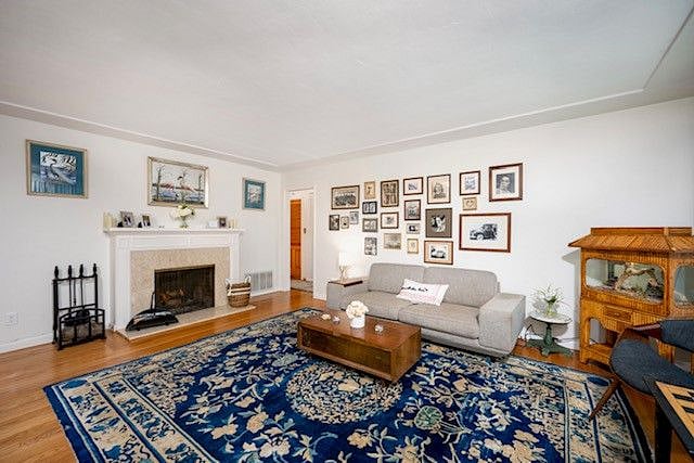 Bright and open concept Living room and dining room with wood burning fireplace