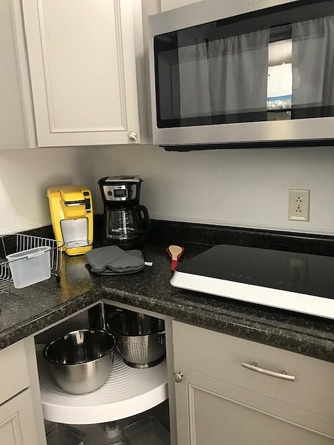 another viiw of the cook top and over the cooktop the microwave.  All appliances are brand new!!!