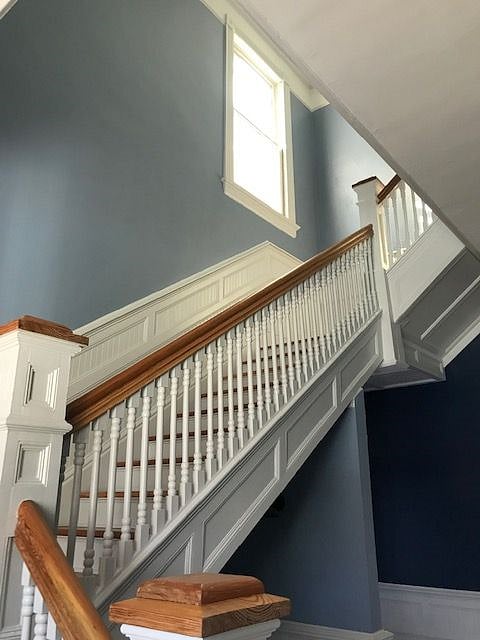 grand stair case leading up to the suite.