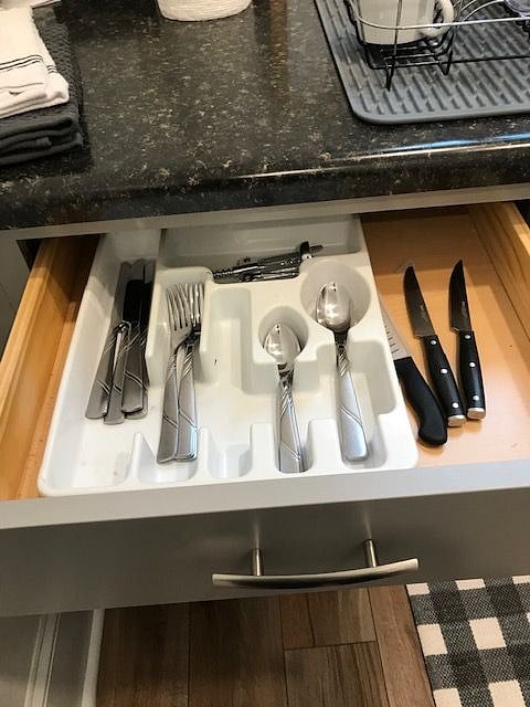 well stocked kitchen.  Plenty of silverware, knives and cooking utensils.