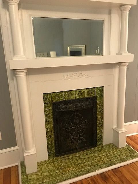 large beautiful fireplace is a focal point in the suite.
