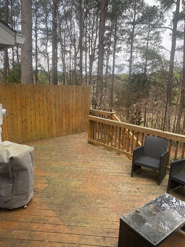Private deck looking out into woods & access to Shelley Lake.
