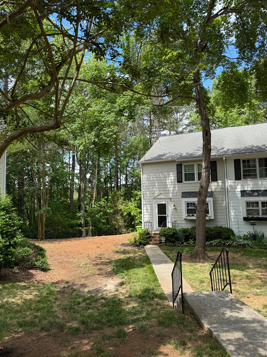 View of townhouse from parking space out front.