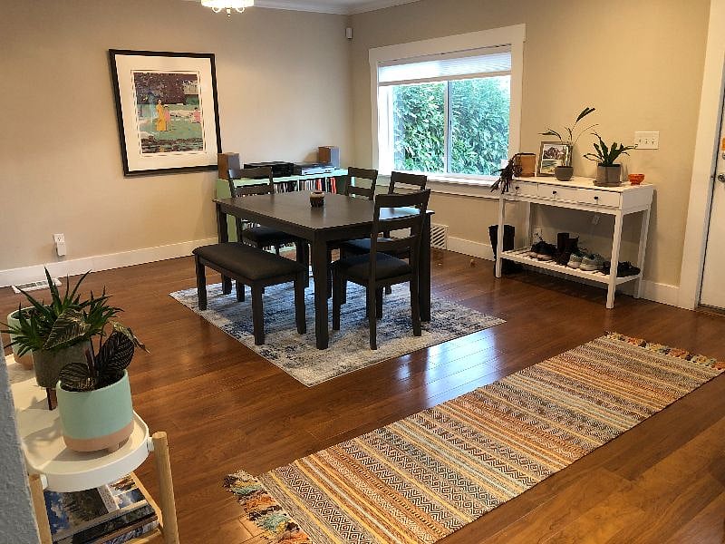 Front door leads into open concept living room and dining room. 