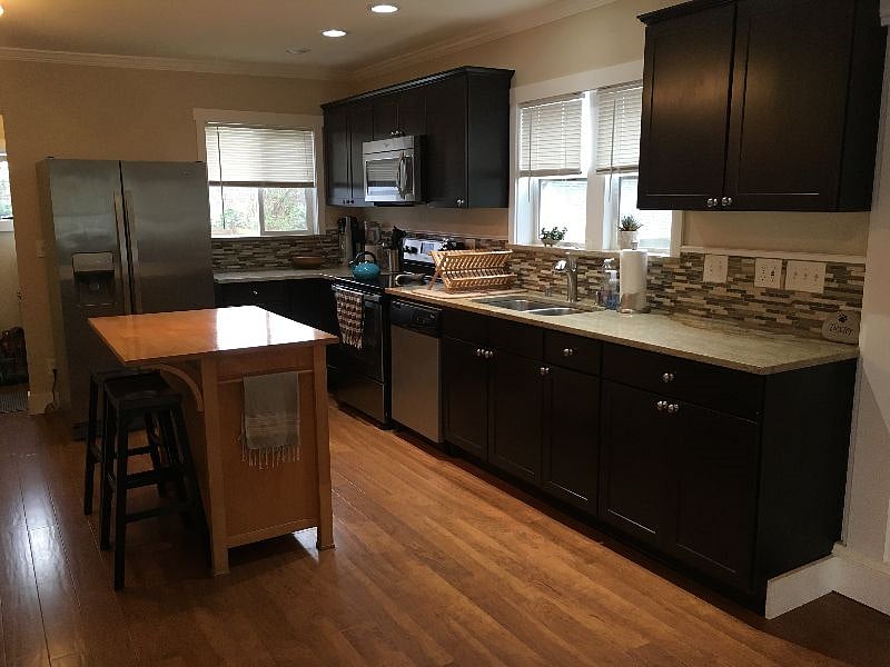 Updated kitchen and stainless steel appliances. 