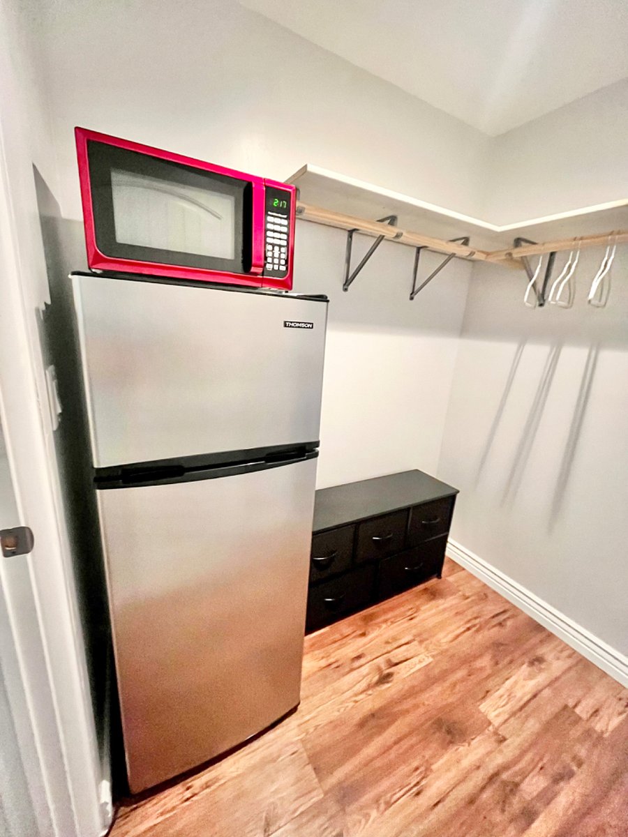 Refrigerator/freezer and microwave.