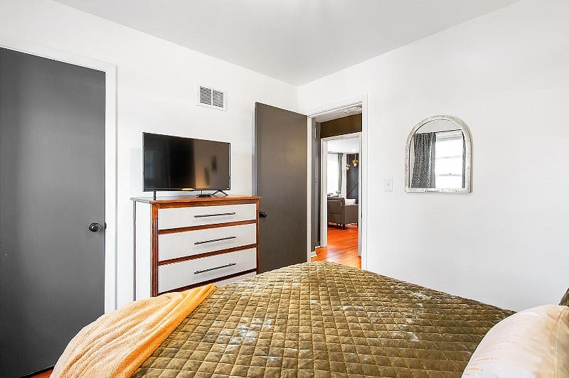 Eclectic Escape Back Bedroom - Queen Bed