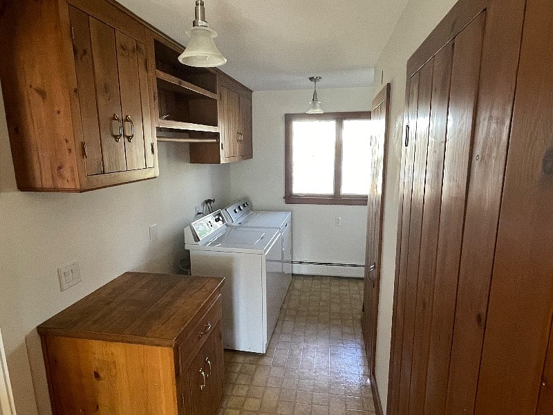 Laundry, shared with downstairs professional adult tenant.