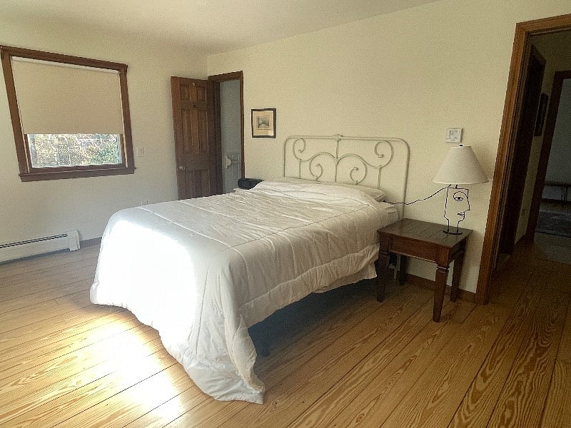 Master Bed  with Queen bed and attached bath with shower.