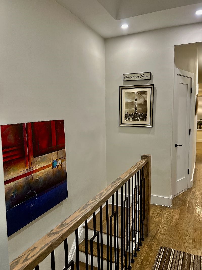 Shared stairwell to the upstairs apartment