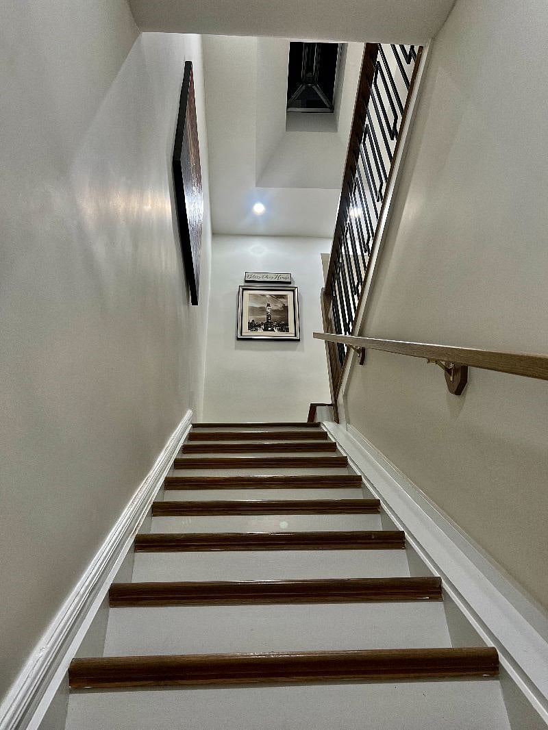 Shared entrance stairwell to the upstairs apartment