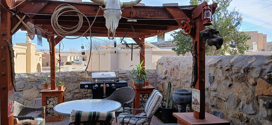 This is my backyard bbq area with a perola I personally built since I am a retired carpenter from the Motion Picture Industry, I have embellished it with antique Western decor that makes it look very cool with rustic feel.
