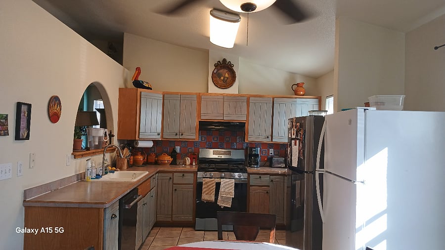 Newly remodeled modern kitchen with new gas range, new dishwasher and your own full-sized refrigerator for your personal use.