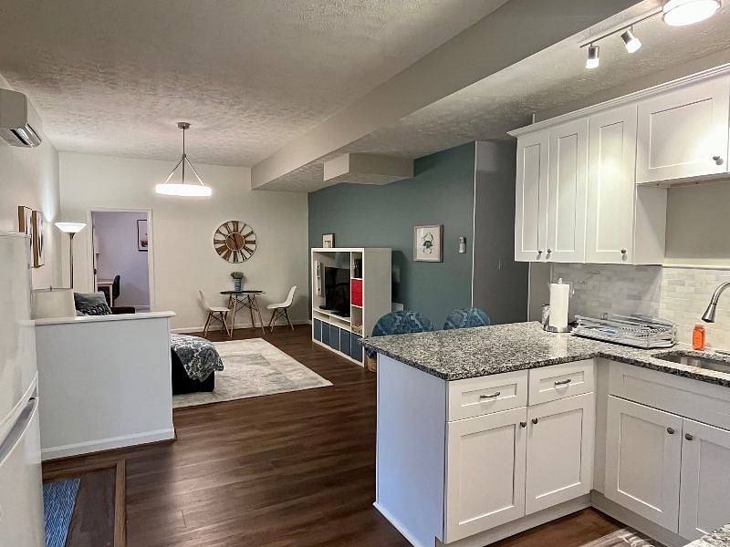 View of the kitchen and living room from the master bedroom.