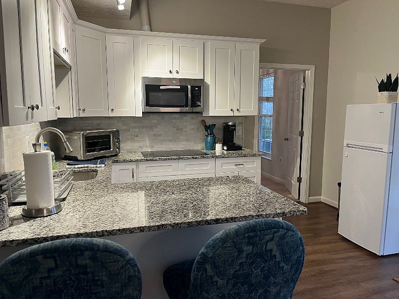 You'll have everything you need in this kitchenette: Cook top, refrigerator, microwave, Breville Smart countertop oven, Keriug, and Instant Pot.