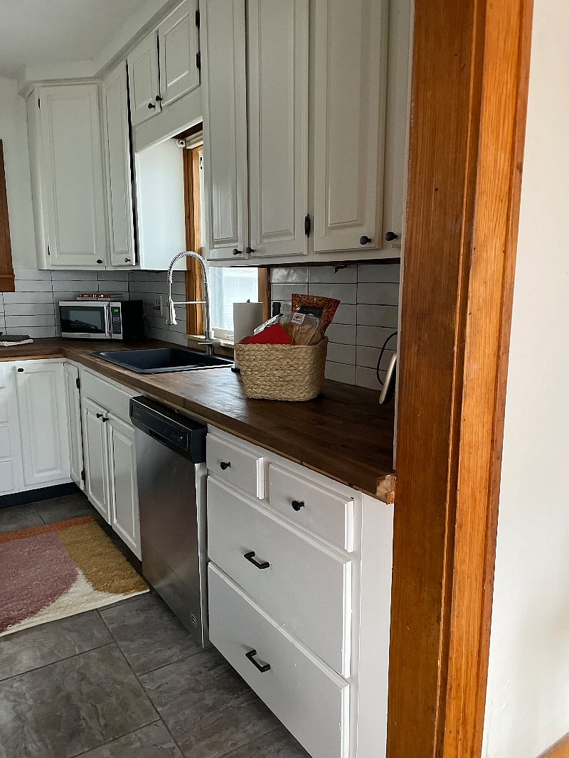 Fully stocked kitchen. Dishwasher, Microwave, Pots and Pans, Coffee Pot, Dishes.