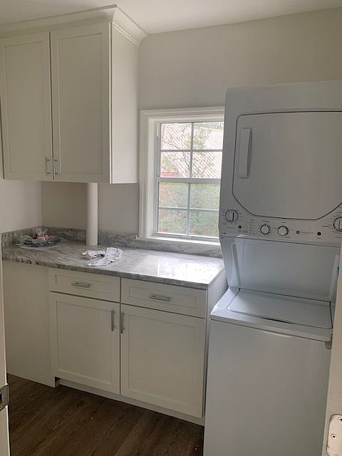 Laundry room - stacked washer and dryer included.