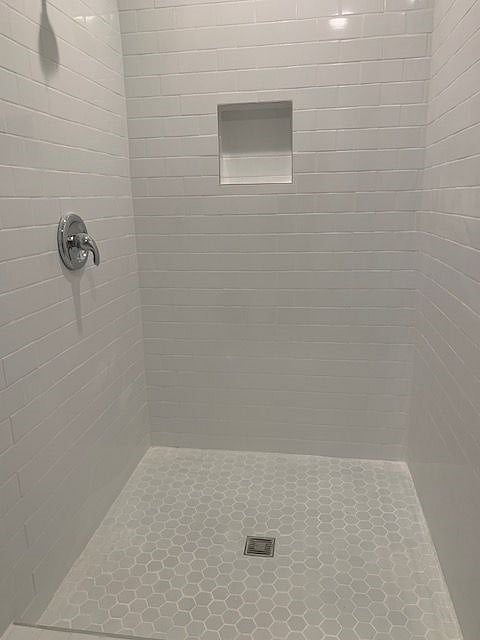 Shower, 4 x 4 tile shower with glass enclosure.