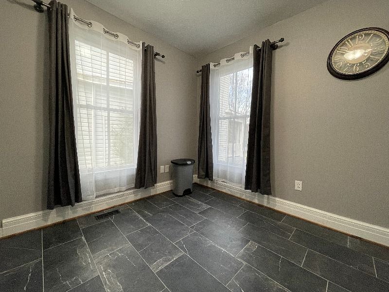Kitchen has 2 windows to let in plenty of natural light.