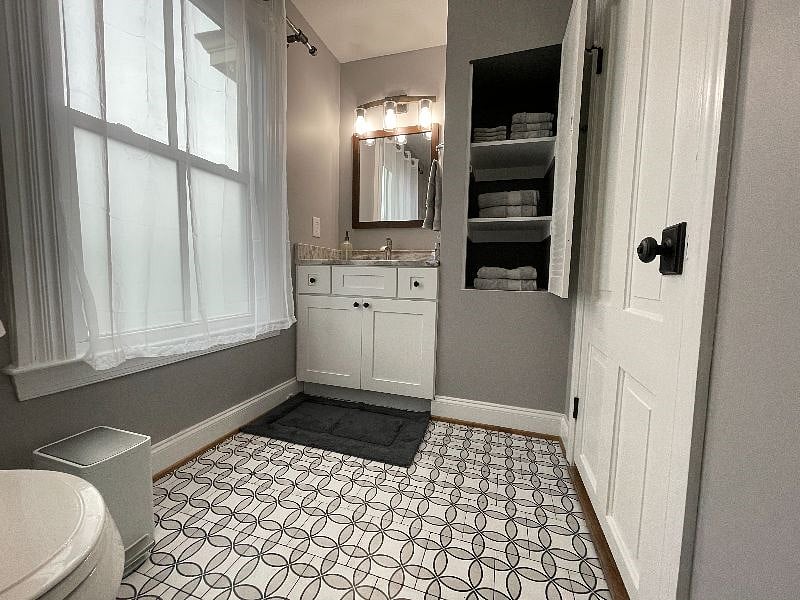 2nd floor hallway bathroom has a window for natural light.