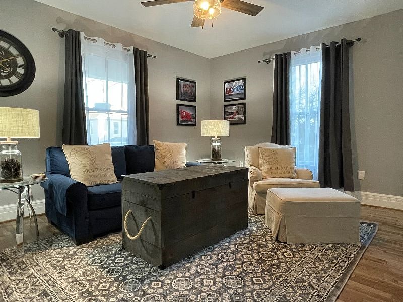 Living room has two windows to allow lots of natural light in.