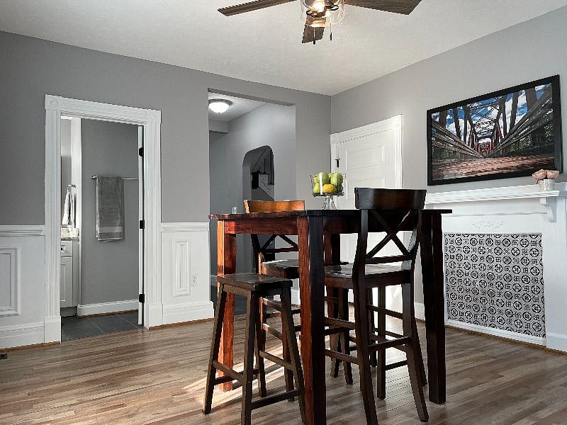 1/2 bathroom is located inside back door off of the dining room.