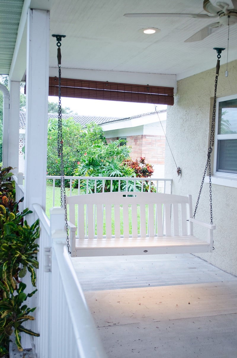 Porch swing to sit and relax on a nice day