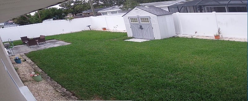 Large Fenced in back yard, with patio/lawn chairs