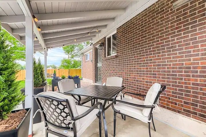 In the far back of the yard is the owner's dedicated patio. Plenty of yard space to share