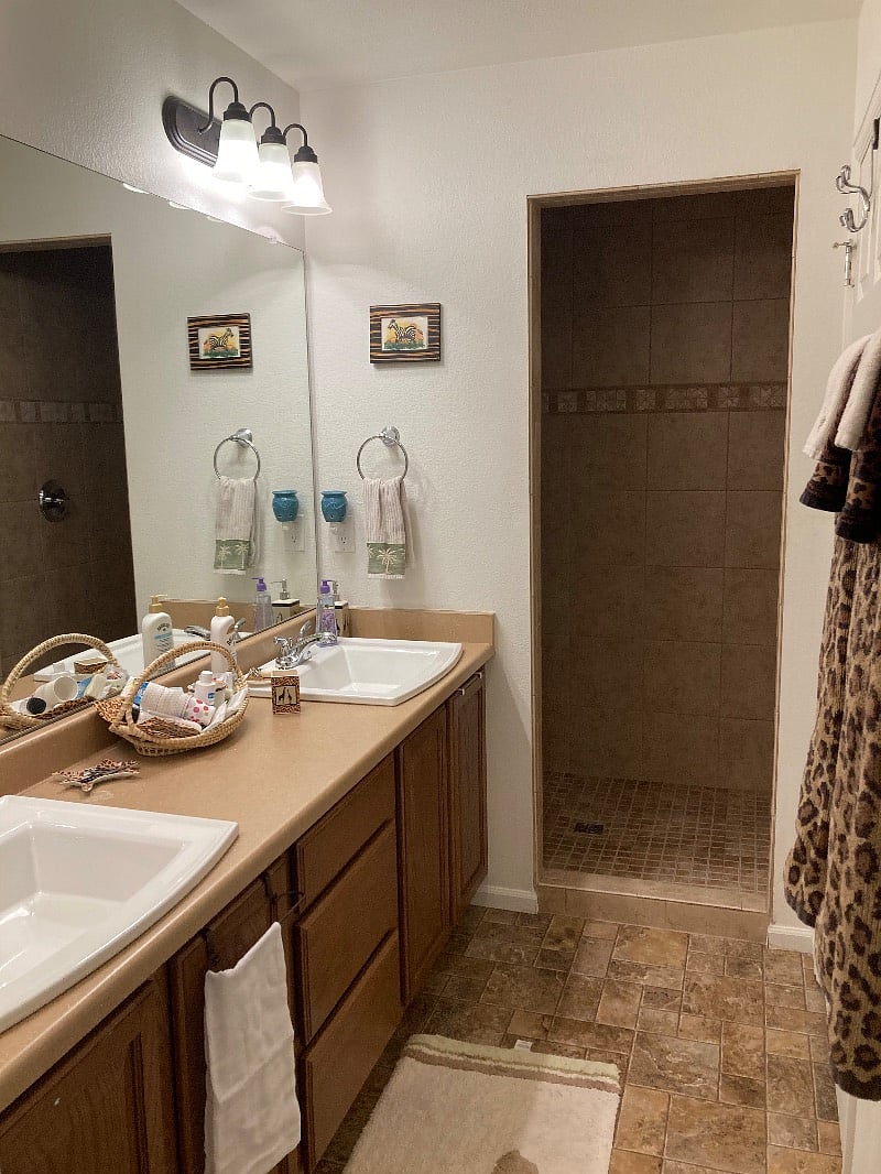 Large, private bathroom--looking toward walk-in shower. Tub is also available in another part of the house if tenant wanted to use it. This is the second sink in the bathroom. 
