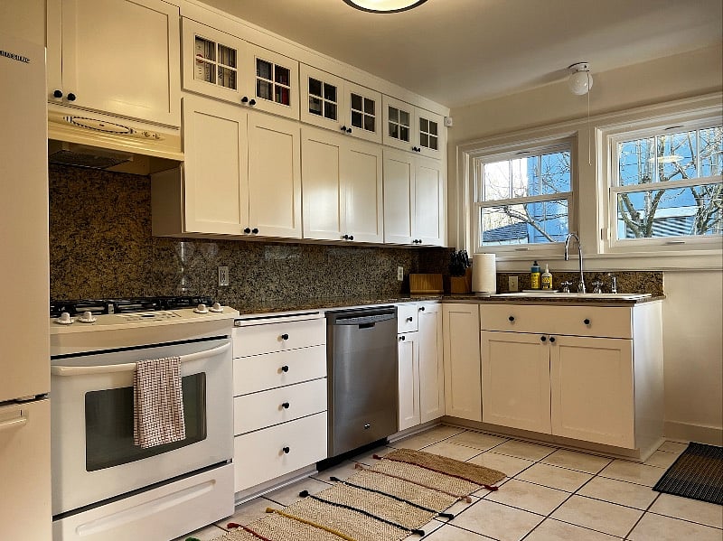 Fully stoked kitchen. Gas range. Natural light. Home chefs will love the amenities provided in this kitchen.