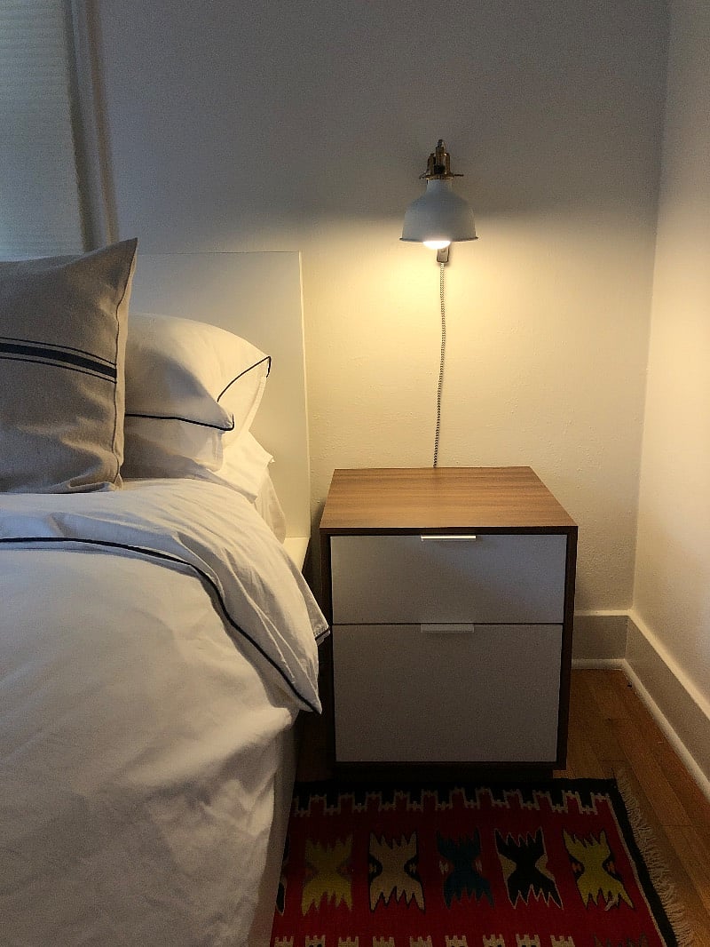 Side tables and reading lights for a cozy evening in bed with your favorite book.