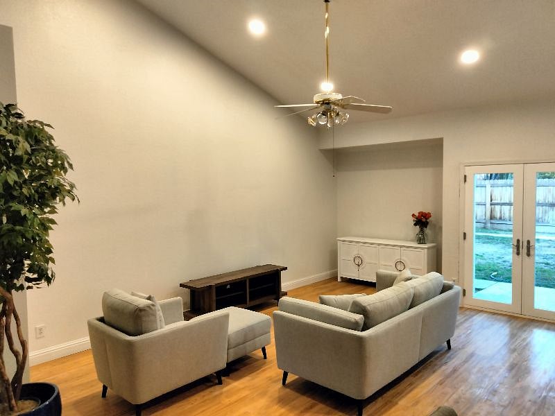 Open space living room French doors to backyard. TV with WiFi access will be available.