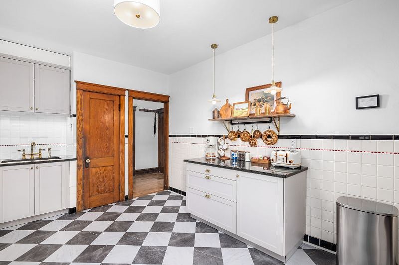 Large kitchen with extra workspace on island.