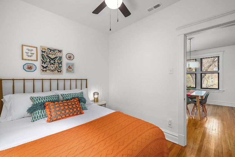 This room also has a small closet for some hanging clothing and a couple of shelves for storage.