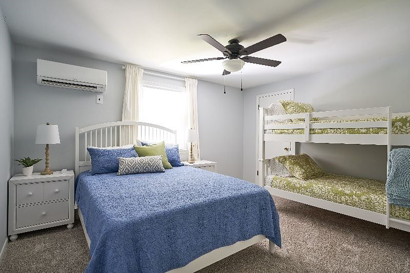 Bedroom #4 - 1 queen bed and 1 bunk bed with twin bed over twin - memory foam mattresses - wall mounted TV with over 500 things to watch.
Heating and cooling wall unit.
Bunkbeds have been replaced by a desk for a work group. They can be added back.