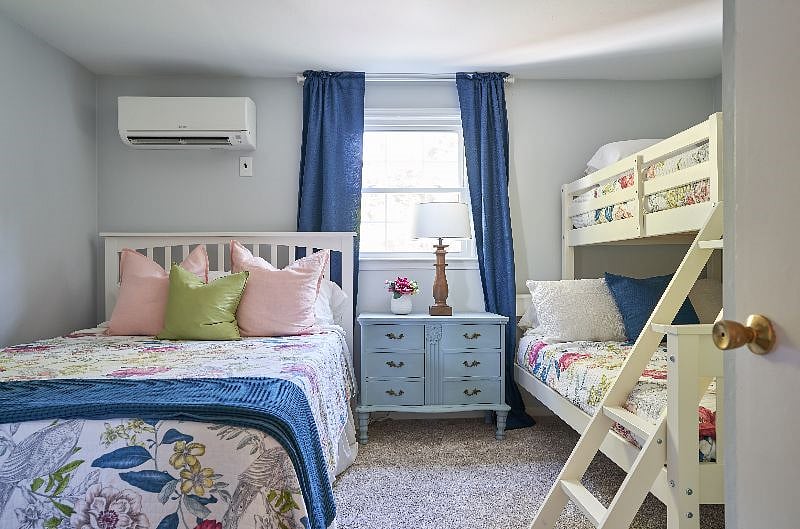 Bedroom #5 - 1 queen bed and 1 bunk bed with twin bed over double - memory foam mattresses - wall mounted TV with over 500 things to watch.
Heating and cooling wall unit. There is a desk in place of the bunk right now. Bunks can be put back.