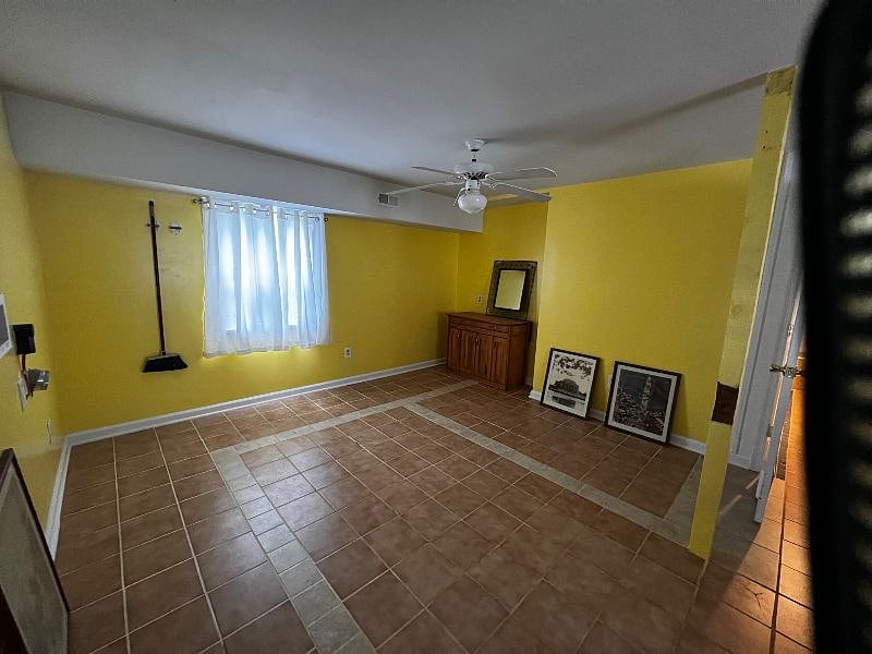 other side of the kitchen. There is now a stackable washer dryer on the left side of the room and I'm moving a small table and some chairs in this week