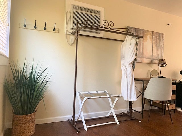 upstairs clothes rack in addition to walk-in closet