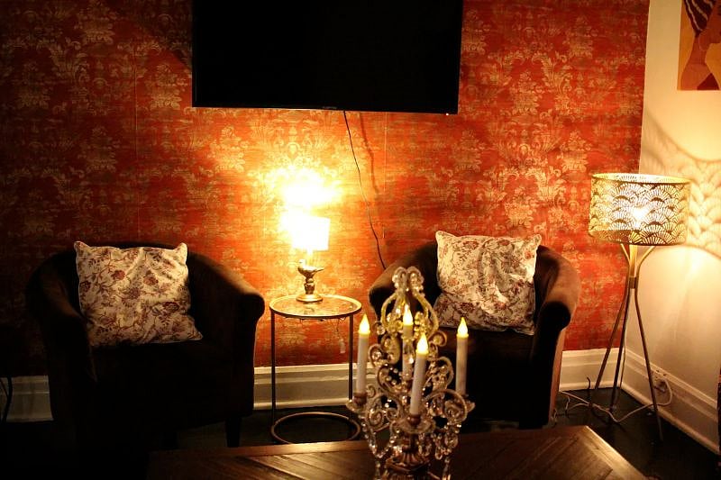 The living room is decorated in a Roaring '20s motif. It's the perfect place to listen to jazz and chat with friends or relax and watch some Netflix.
