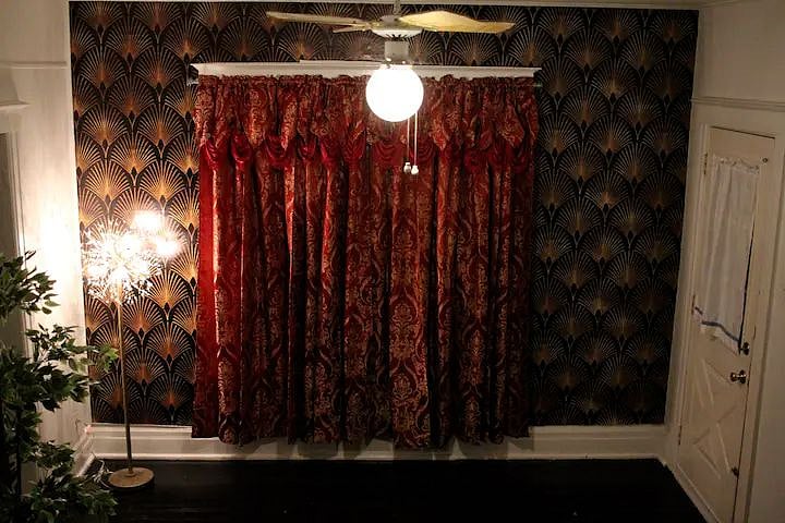 The living room is decorated in a Roaring '20s motif. It's the perfect place to listen to jazz and chat with friends or relax and watch some Netflix.
