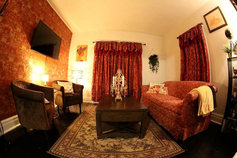 The living room is decorated in a Roaring '20s motif. It's the perfect place to listen to jazz and chat with friends or relax and watch some Netflix.
